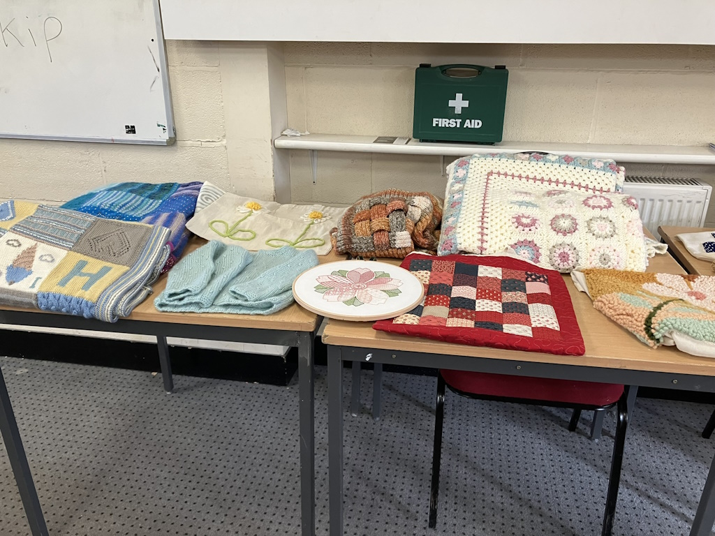 Work of various members over the winter, including blank canvas Tote Bags we received for Christmas